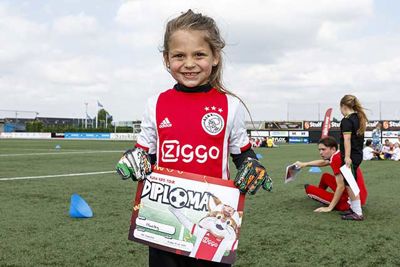 Trots op haar diploma. © Pro Shots